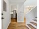 Hallway entrance to kitchen showcasing stainless steel refrigerator and light fixtures at 346 Carpenter Dr # 77, Sandy Springs, GA 30328