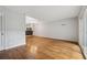 Bright, open living room featuring hardwood floors and a sliding glass door to the outside at 346 Carpenter Dr # 77, Sandy Springs, GA 30328
