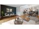 Inviting living room boasts hardwood floors and an open floor plan to the kitchen and dining areas at 346 Carpenter Dr # 77, Sandy Springs, GA 30328