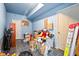 Finished basement with blue painted walls and tiled flooring at 5181 Saint Claire Pl, Powder Springs, GA 30127