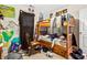 A bedroom featuring a wooden bunk bed and colorful wall decorations at 5181 Saint Claire Pl, Powder Springs, GA 30127