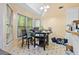 Bright breakfast nook with tile floors and a large picture window at 5181 Saint Claire Pl, Powder Springs, GA 30127