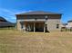 Large backyard with a covered patio area, perfect for outdoor entertaining at 812 Graeme Dr, Mcdonough, GA 30252