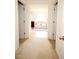 Hallway view showing a large bathtub and bathroom at 812 Graeme Dr, Mcdonough, GA 30252