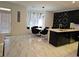 Stylish eat-in kitchen with modern decor, marble floors, island, and natural light at 812 Graeme Dr, Mcdonough, GA 30252