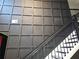 Close up of a staircase featuring dark wainscoting at 812 Graeme Dr, Mcdonough, GA 30252
