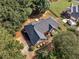 Charming single-Gathering home with a well-maintained lawn and mature trees in the backyard at 925 Champions Way, Mcdonough, GA 30252