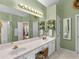 Spacious bathroom with double vanity, walk-in shower, and tiled floor at 925 Champions Way, Mcdonough, GA 30252