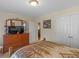 Bedroom featuring a dresser, mirror, and closet space at 925 Champions Way, Mcdonough, GA 30252