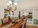 Open-concept dining room offering seamless access to the kitchen and living spaces at 925 Champions Way, Mcdonough, GA 30252