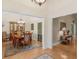 Beautiful foyer showcasing hardwood floors, adjacent to the formal dining room at 925 Champions Way, Mcdonough, GA 30252