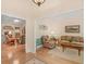 Welcoming foyer with hardwood floors leading into a spacious living area and other rooms at 925 Champions Way, Mcdonough, GA 30252