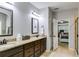 Spacious bathroom with double sinks, ample counter space, and neutral tones, ideal for a relaxing atmosphere at 127 Grayson Myers Dr, Villa Rica, GA 30180