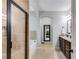 Elegant bathroom featuring a soaking tub, separate shower, and tiled floors for a spa-like experience at 127 Grayson Myers Dr, Villa Rica, GA 30180