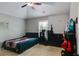 This is a neutral bedroom with carpet and black furniture at 127 Grayson Myers Dr, Villa Rica, GA 30180