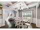 Beautiful dining room with dark hardwood floors and natural light at 127 Grayson Myers Dr, Villa Rica, GA 30180