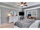 Comfortable main bedroom with large windows, providing plenty of natural light and a peaceful atmosphere at 127 Grayson Myers Dr, Villa Rica, GA 30180