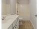 Standard bathroom with a shower-tub combo and a single sink vanity at 3717 Lockerbie Ln, Powder Springs, GA 30127