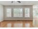 Large living area with multiple windows providing lots of natural light at 3717 Lockerbie Ln, Powder Springs, GA 30127