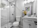 Modern bathroom featuring glass shower, sleek vanity and tile floor at 4134 Burgess Dr, Decatur, GA 30035