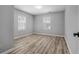 Empty bedroom featuring wood-look floors and neutral walls at 4134 Burgess Dr, Decatur, GA 30035