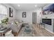 Cozy living area with plush seating, modern decor, and a fireplace at 4134 Burgess Dr, Decatur, GA 30035