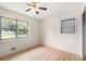 An ample-sized bedroom featuring a window and closet providing natural light at 2954 Ann Marie Ln, Rex, GA 30273