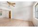 Light-filled living area with new floors and classic chandelier fixture at 2954 Ann Marie Ln, Rex, GA 30273