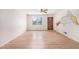 Spacious living room with modern flooring, ceiling fan, and decorative wall art at 2954 Ann Marie Ln, Rex, GA 30273