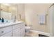 Bathroom featuring a vanity, toilet, and glass-enclosed walk-in shower at 3302 Dogwood Dr # 328, Atlanta, GA 30354