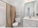Bathroom featuring a vanity, toilet, and shower with curtain at 3302 Dogwood Dr # 328, Atlanta, GA 30354