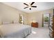 Spacious bedroom with large windows, a ceiling fan, and classic decor at 3302 Dogwood Dr # 328, Atlanta, GA 30354