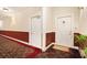 Hallway showing unit doors and decor at 3302 Dogwood Dr # 328, Atlanta, GA 30354