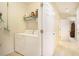 Functional laundry room with washer, dryer, and shelving for storage at 3302 Dogwood Dr # 328, Atlanta, GA 30354
