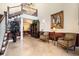 Apartment lobby with staircase, tile floor, seating, large artwork, and view of hallway at 3302 Dogwood Dr # 328, Atlanta, GA 30354