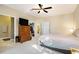 Bright main bedroom with walk-in closet, ceiling fan, and en-suite bathroom at 3302 Dogwood Dr # 328, Atlanta, GA 30354