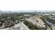 Aerial view of residential and commercial buildings, pond, and trees in Atlanta at 361 17Th Nw St # 2315, Atlanta, GA 30363