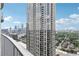 City view from balcony with a tall skyscraper in view at 361 17Th Nw St # 2315, Atlanta, GA 30363