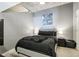 Modern bedroom featuring concrete ceiling, gray walls, and minimalist decor at 361 17Th Nw St # 2315, Atlanta, GA 30363