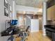 Inviting home office with modern desk setup and natural light, with hardwood floors and modern decor at 361 17Th Nw St # 2315, Atlanta, GA 30363