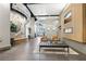 Modern lobby with comfortable seating, unique art installation, and sleek fireplace feature at 361 17Th Nw St # 2315, Atlanta, GA 30363