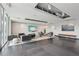 Inviting lounge area with ample seating, a large TV, and modern decor for relaxation at 361 17Th Nw St # 2315, Atlanta, GA 30363