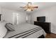 Bedroom with hardwood flooring and a ceiling fan at 4680 Brighton Lake Dr, Cumming, GA 30040