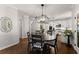 Open dining area showcasing seamless flow into the kitchen and staircase at 4680 Brighton Lake Dr, Cumming, GA 30040