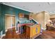 Stylish bar area with custom cabinetry and a mini-fridge at 5260 Harbury Ln, Suwanee, GA 30024