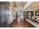 Inviting foyer with hardwood floors, soaring ceilings, and elegant staircase at 5260 Harbury Ln, Suwanee, GA 30024