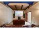 Home theater room with projector, tiered seating and themed decorations and lighting at 5260 Harbury Ln, Suwanee, GA 30024