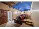Custom home theater with multi-tiered seating, themed decor, starscape ceiling, and projector at 5260 Harbury Ln, Suwanee, GA 30024