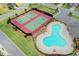 Aerial view showcasing the community pool and tennis courts, highlighting recreational amenities at 5870 Shiloh Woods Dr, Cumming, GA 30040