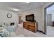 Second bonus room with plush seating, TV and ample space for activities at 5870 Shiloh Woods Dr, Cumming, GA 30040